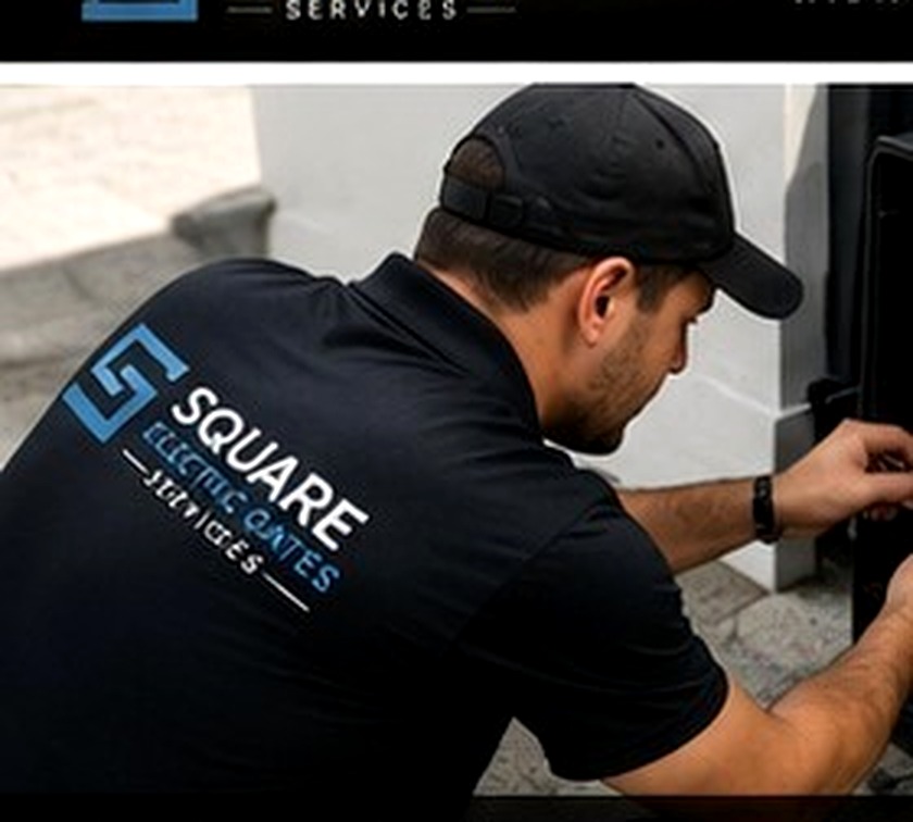 Technician working on an electric gate system